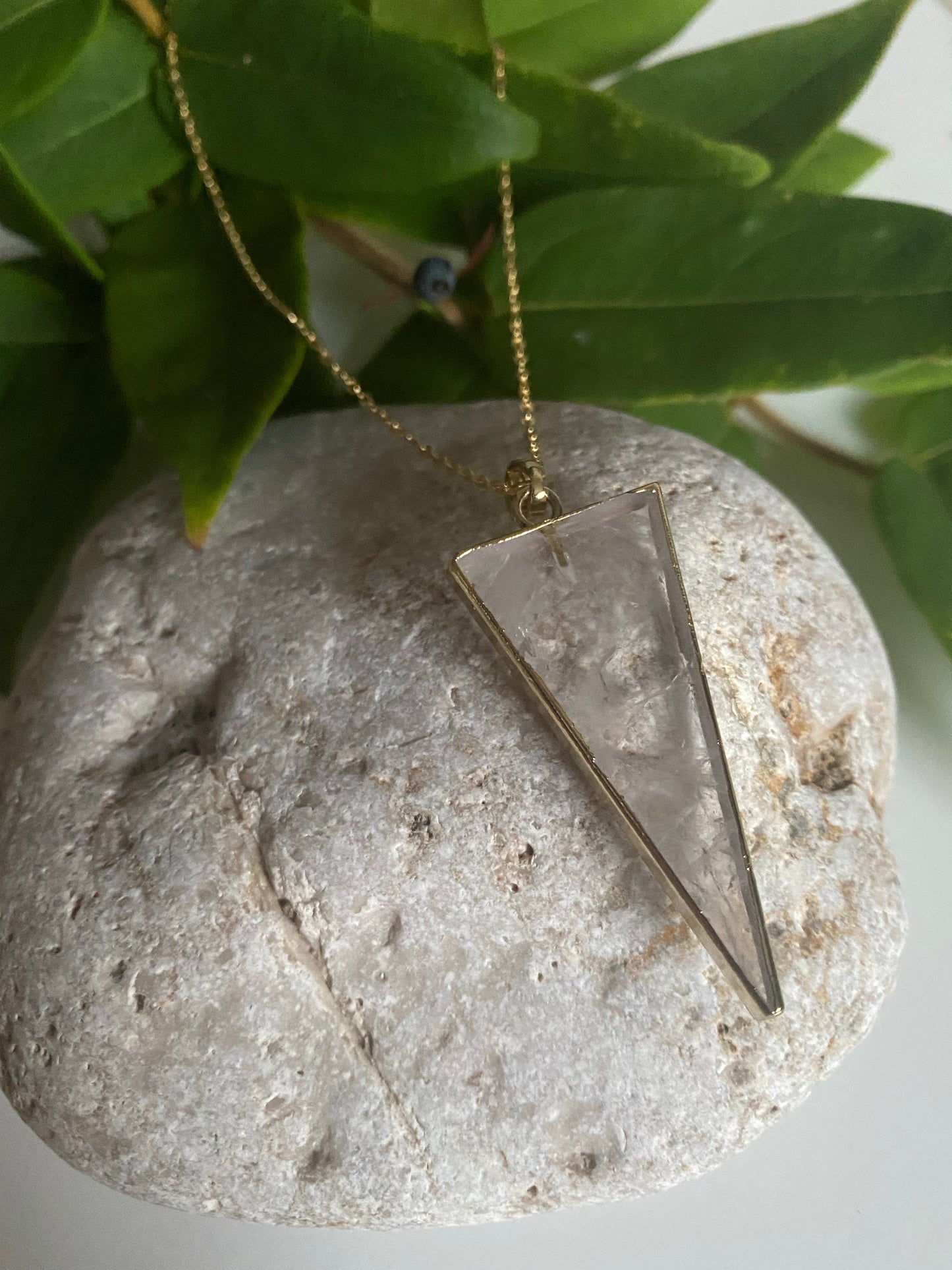 Clear Quartz triangle pendant on a gold plated necklace