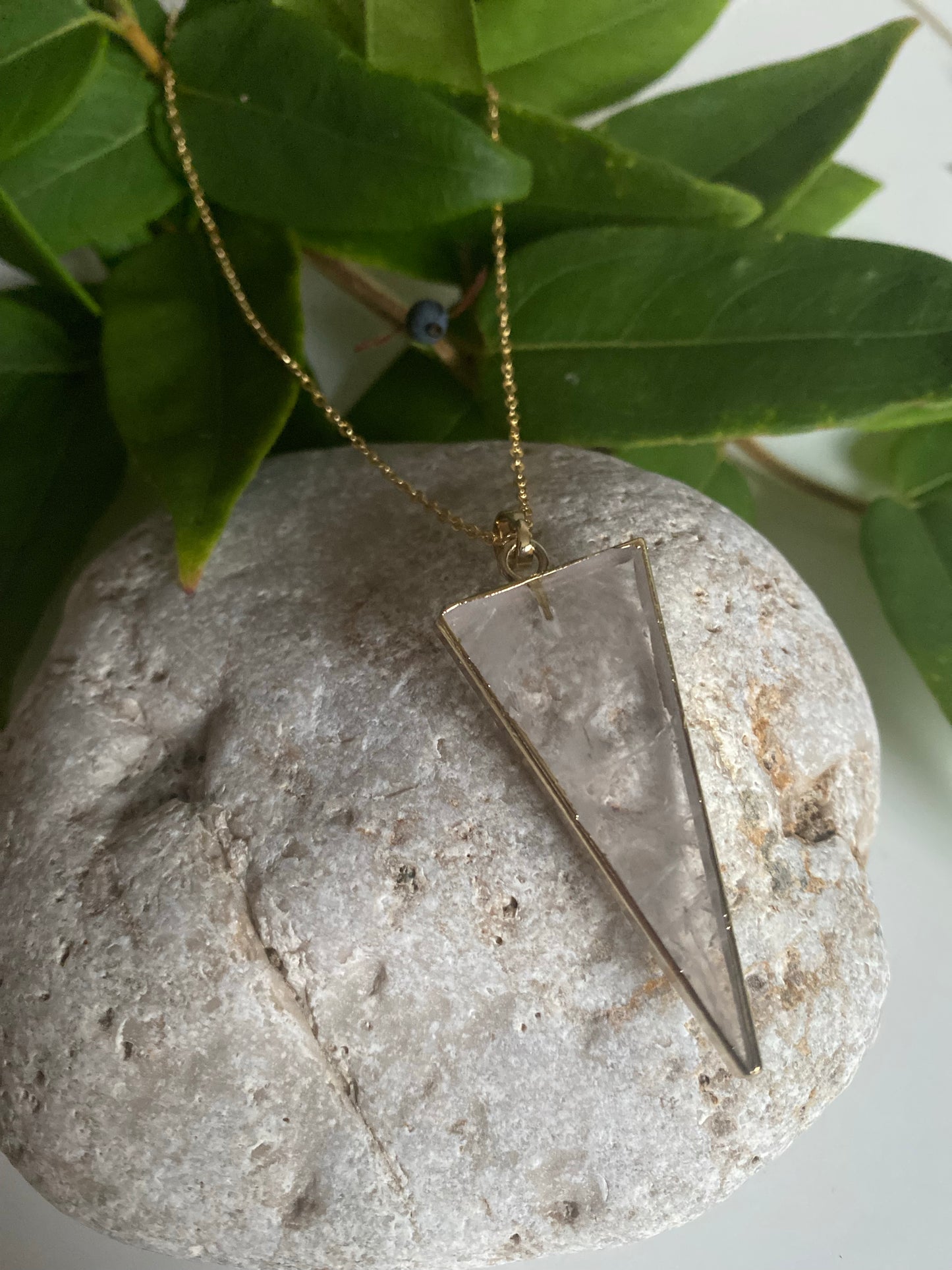 Clear Quartz triangle pendant on a gold plated necklace